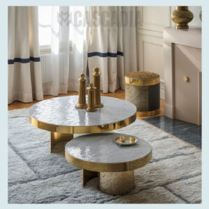 Table basse ronde en zellige blanc avec finition en laiton, fabriquée artisanalement à Marrakech.