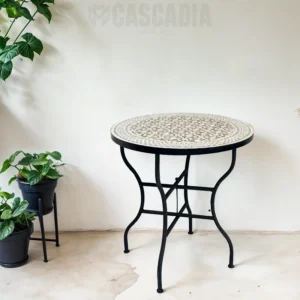 Table Galaxy en zellige noir et blanc, fabriquée à la main à Marrakech avec pieds dorés élégants.